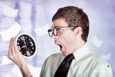 Rowing - Stressed male office worker holding overtime clock by Jorgo Photography