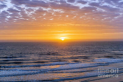Beach Photos - Sunrise over Atlantic ocean by Elena Elisseeva