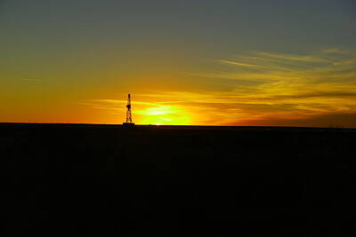 Birds Royalty-Free and Rights-Managed Images - Sunset on an oil rig Jal New Mexico by Jeff Swan