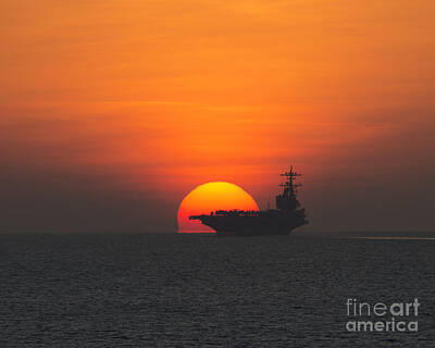 Transportation Royalty-Free and Rights-Managed Images - Sunset over the aircraft carrier  by Celestial Images