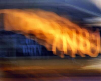 Nothing But Numbers Royalty Free Images - Taxi Lights in Motion Royalty-Free Image by Karin Kohlmeier