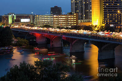Moody Trees - Thousands of patrons on the Congress Bridge watch the bats to take flight during the Austin Bat Fest by Dan Herron