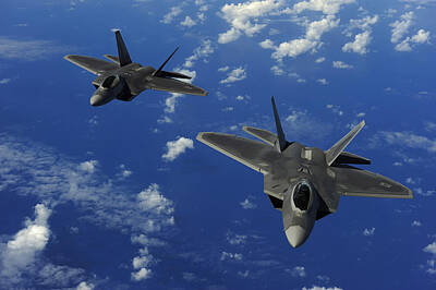Transportation Royalty-Free and Rights-Managed Images - U.s. Air Force F-22 Raptors In Flight by Stocktrek Images