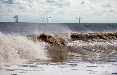 Seascapes Larry Marshall - Waves breaking against the beach with wind farm in the background Skegness Lincolnshire England by Michael Walters