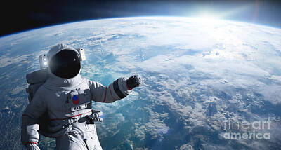 New Years - Astronaut conducting spacewalk on Earth orbit. by Michal Bednarek
