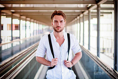 Rose - Handsome young man walking in city with backpack by Stefano C