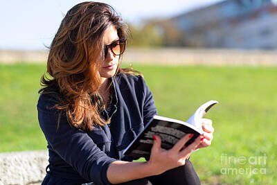 Michael Jackson Royalty Free Images - Woman reading a book Royalty-Free Image by Wdnet Studio