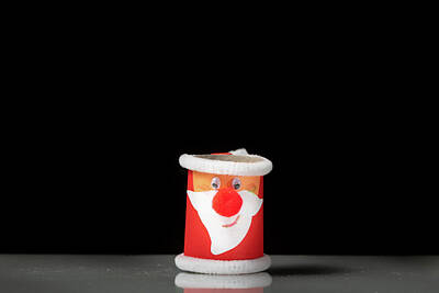 Airplane Paintings Royalty Free Images - A small figure of Santa Claus made of a toilet paper roll by a child Royalty-Free Image by Stefan Rotter