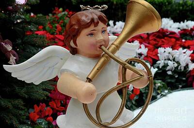 Music Royalty-Free and Rights-Managed Images - Christmas angel statue plays French horn trumpet brass music instrument  by Imran Ahmed