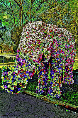 Travel Pics Rights Managed Images - Elephant. Flowers. Royalty-Free Image by Andy i Za