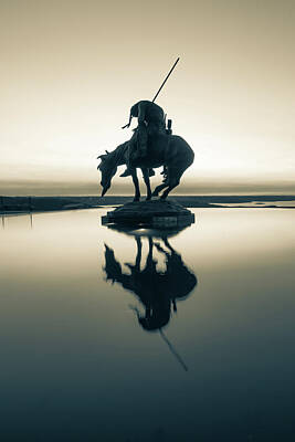 Still Life Royalty Free Images - End of the Trail Statue Silhouette - Top of the Rock Reflections in Sepia Royalty-Free Image by Gregory Ballos