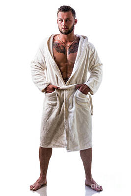 Adventure Photography - Handsome muscular young man wearing white bathrobe, isolated by Stefano C
