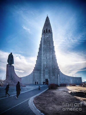 Thomas Kinkade Rights Managed Images - People near amazing Lutheran church in Iceland Royalty-Free Image by Stefano C