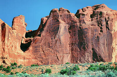 Surrealism Photo Royalty Free Images - Red Cliff Faces at Arches National Park Utah Royalty-Free Image by Wernher Krutein