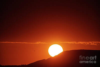 Purely Purple - Sundown behind a hill by Jeff Swan