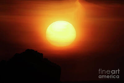 Spot Of Tea - Sunfall behind a rock on the Oregon coast by Jeff Swan