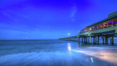 Travel Pics Rights Managed Images - The Moon and the Sea Royalty-Free Image by Mark Andrew Thomas