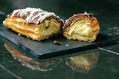 Just Desserts Rights Managed Images - Home-made Eclair with mango whipped cream Royalty-Free Image by Rob D