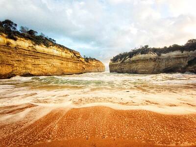 Beach Photo Rights Managed Images - Loch and Gorge Royalty-Free Image by Jijo George