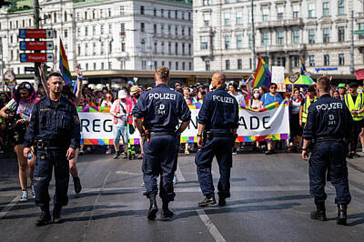Curated Weekender Tote Bags - Police at Vienna Pride on Wiener Ringstrasse by Stefan Rotter