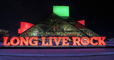 Rock And Roll Royalty-Free and Rights-Managed Images - Rock and Roll Hall of Fame in Holiday Colors in Cleveland, Ohio by Peter Ciro