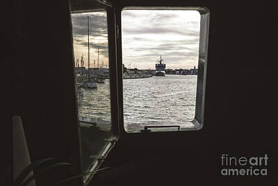 Cultural Textures - Ship moored to port seen through from inside the porthole of a ship. by Joaquin Corbalan