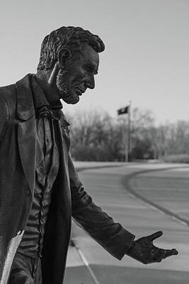 Politicians Photo Royalty Free Images - Abraham Lincoln statue in the Abraham Lincoln National Cemetery in Elwood Illinois Royalty-Free Image by Eldon McGraw