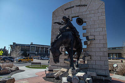 Thomas Moran Royalty Free Images - Breakin Through statue at the University of Wyoming Royalty-Free Image by Eldon McGraw