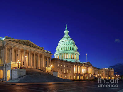 Politicians Photo Royalty Free Images - Evening view of the United States Capitol Royalty-Free Image by Chon Kit Leong