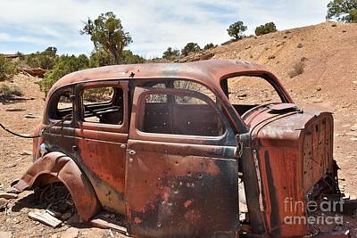 Seamstress - Rusty old car in the desert by Tonya Hance