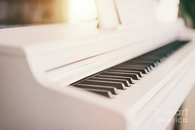 Jazz Photos - Classic white piano keyboard by Michal Bednarek