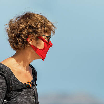Spring Fling - Woman wearing a mask on the street by Stefan Rotter