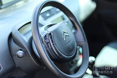 Lights Camera Action - Citroen C4 modern steering wheel close up with brand logo by Dragos Nicolae Dragomirescu