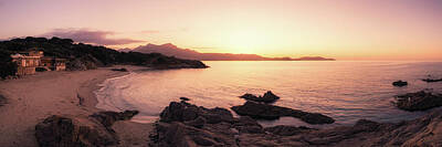 The Bunsen Burner - Sun setting over beach and calvi citadel in Corsica by Jon Ingall