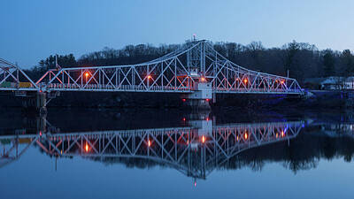 Skylines Photos - A bridge with lights on it is reflected in the water by Kyle Lee