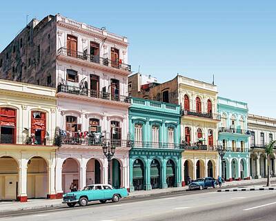Western Buffalo Royalty Free Images - A colorful strip of buildings in Havana, Cuba. - two cars parked outside building - Havana, Cuba Royalty-Free Image by Julien