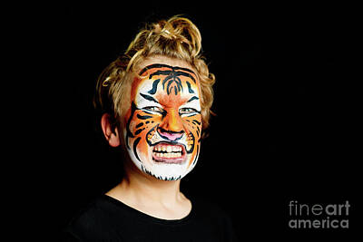 Multichromatic Abstracts - A growling boy with his face painted in the striking colors of a by Joaquin Corbalan