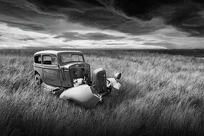 Randall Nyhof Royalty-Free and Rights-Managed Images - Abandoned Prairie Auto under Dark Skies in Black and White by Randall Nyhof
