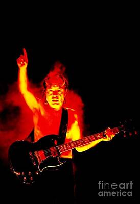 Rock And Roll Rights Managed Images - AC DC Angus Young in Hell Royalty-Free Image by Michael Butkovich