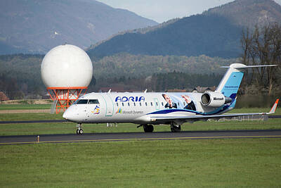 Cowboy - Adria aircraft with Microsoft advertising on the side at Ljublja by Ian Middleton