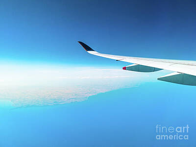 Modern Man Air Travel - Airplane In Clear Blue Sky by Benny Marty