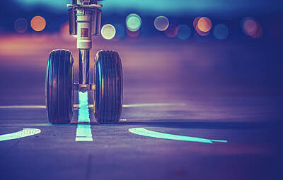 Royalty-Free and Rights-Managed Images - Airplane Wheels On The Runway At Sunset by Mr Doomits