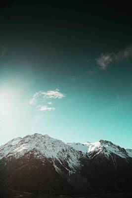 Curated Travel Chargers - Aoraki Mount Cook National Park - white and black mountains by Julien