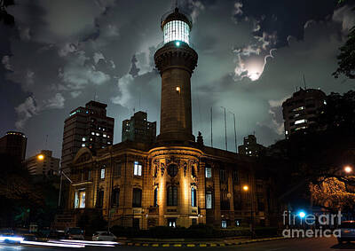 Landmarks Paintings - Buenos Aires Palacio Barolo with its lighthouseinspired design standing stoically amidst the darkness silhouettes of the night by Cortez Schinner