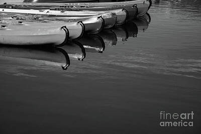 Abstract Landscape Photos - Canoe boats mooring on lake. Black white by Elena Dijour