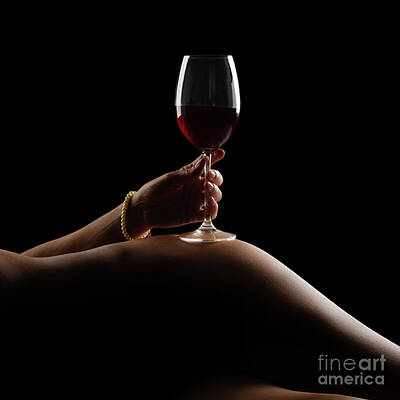 Queen Rights Managed Images - Caucasian naked model holds wineglass on her hip Royalty-Free Image by Dmytro Mykhailov