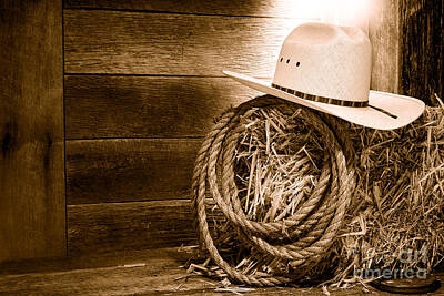 Landmarks Royalty-Free and Rights-Managed Images - Cowboy Hat on Hay Bale - Sepia  by American West Legend