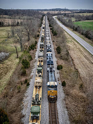 I Want To Believe Posters Rights Managed Images - CSX E302 passes a loaded military train at Kelly Kentucky Royalty-Free Image by Jim Pearson