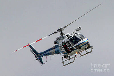 Bath Time - Eurocopter AS 350 in Flight by Wernher Krutein
