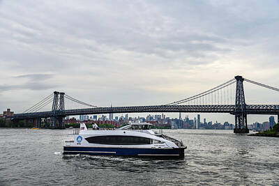 Monochrome Landscapes Royalty Free Images - Ferry on East river against Williamsburg Bridge and skyline of New York Royalty-Free Image by JJF Architects